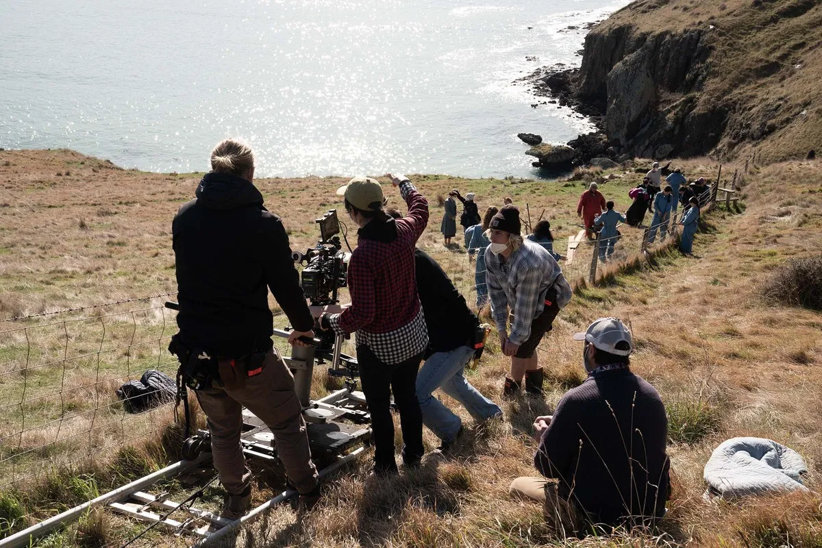 On set of We Were Dangerous, filming on the hill