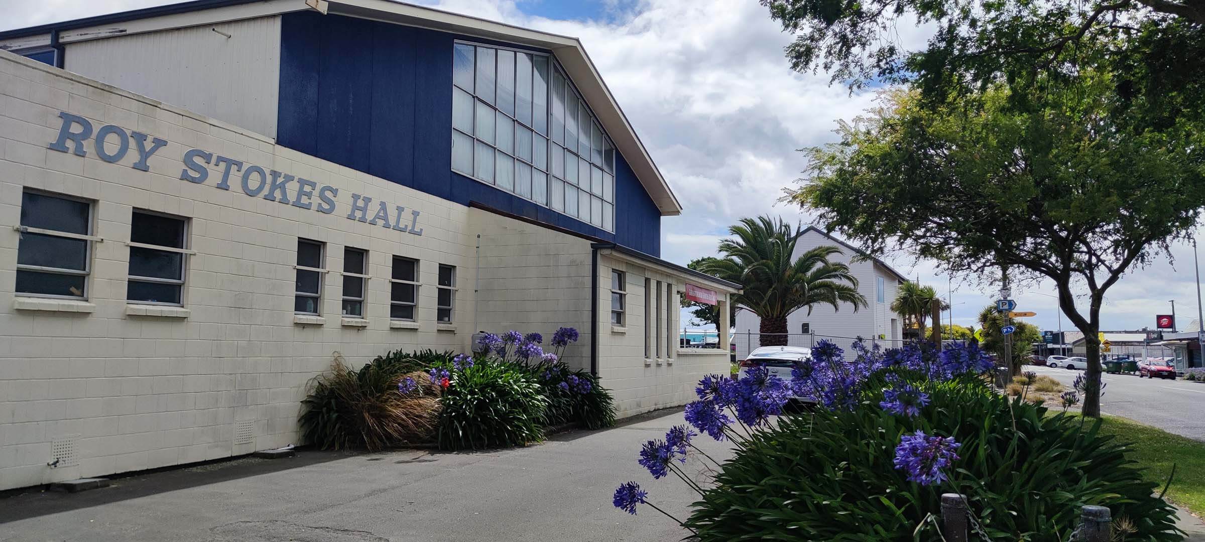 Roy Stokes Hall Exterior With Garden And Road